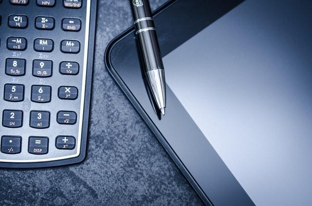 A tablet a paen and a calculator